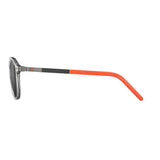 Side view of Julbo Link Sunglasses (Size 52) with a transparent frame and vibrant orange Grip Tech temples, ensuring a snug fit.