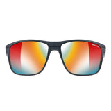 The Julbo Renegade Sunglasses | Size 61, by Julbo, feature black frames and reflective lenses that display a stunning gradient of red, orange, and blue hues. With Grip Tech Temples for a secure fit, these sunglasses are perfect for any adventure.
