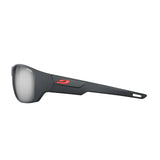 Julbo Rookie 2 Sunglasses in size 58 showcase an ergonomic design with sleek black frames, mirrored REACTIV lenses, and a bold red logo on the temple.
