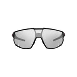 The Julbo Rush Sunglasses by Julbo are black cycling glasses with a sleek design, adjustable temples, and reflective photochromic lenses, viewed from the front.