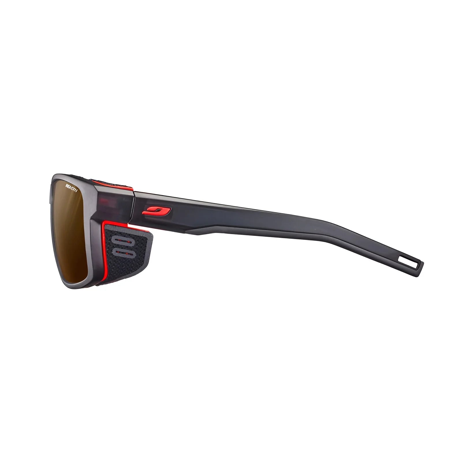 The Julbo Shield Sunglasses, size 59, showcase a sleek profile with black sports design, red accents, and side shields. Equipped with Grip Nose technology for a secure fit and Air Flow ventilation for optimal comfort during intense activities.