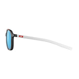 Side view of Julbo Slack Sunglasses in size 52, featuring Spectron HD blue lenses, a sleek black frame, and white Bio-Sourced Rilsan arms with a small red logo.
