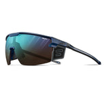The Julbo Ultimate Cover Sunglasses feature a stylish blue, futuristic design with dark lenses on a white background, perfect for mountain enthusiasts.