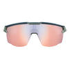 The Julbo Ultimate Sunglasses by Julbo offer a sleek, wraparound design with reflective orange-tinted lenses, providing athletes with ultimate freedom through panoramic vision and a secure fit.