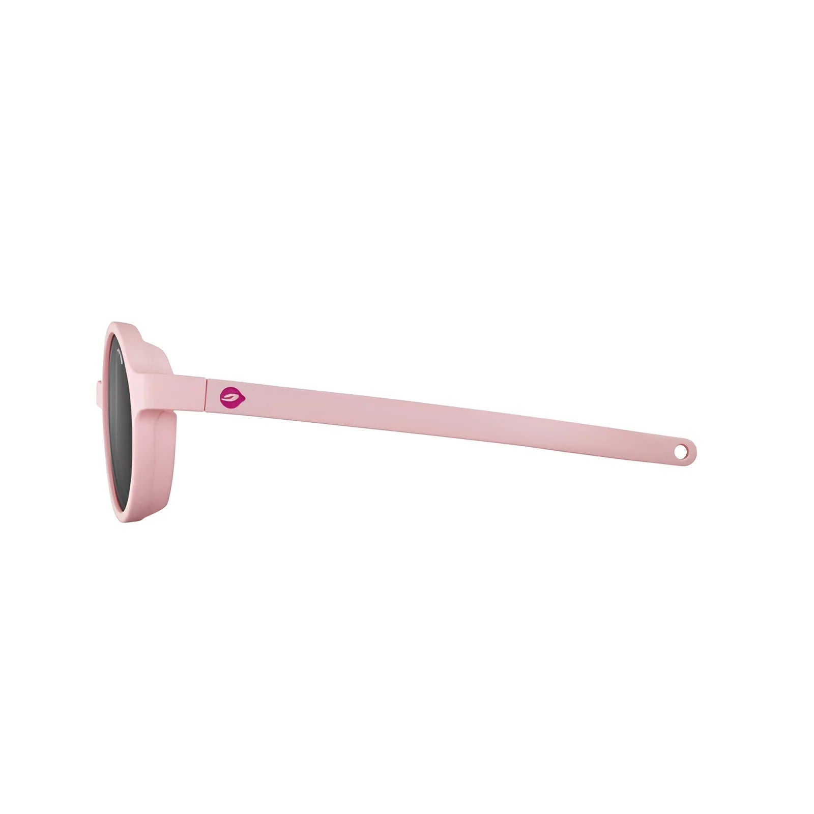 The Julbo Walk Sunglasses in Size 39 are stylish pink kids' sunglasses with round frames and a small lip icon on the arms, viewed from the side. Crafted for durability, they blend style and resilience perfectly.